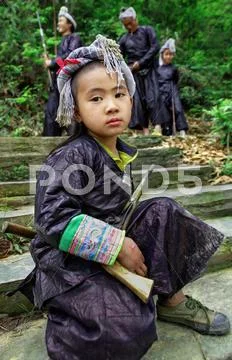 GUIZHOU, CHINA - APRIL 10: Ethnic Minorities, Chinese boy at the age of 8 yea Stock Photos