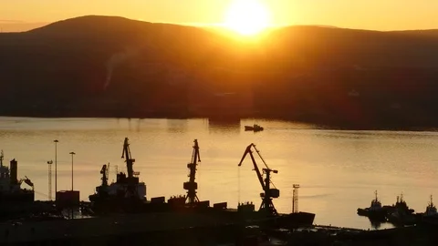 Gulf and seaport on the background setting behind the hills sun . Stock Footage 83159875
