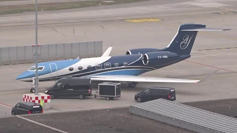 Gulfstream business jet script y logo three tone livery stands beside ground Vídeo Stock 328123300