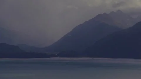 Gull Soaring in Slowmo over Cloudy Bay and Mountains Stock Footage 12141295