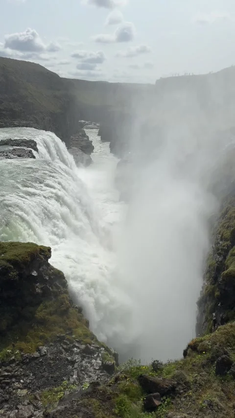Gullfoss waterfall crashes down in two powerful stages into a deep gorge  Stock Footage 312232909