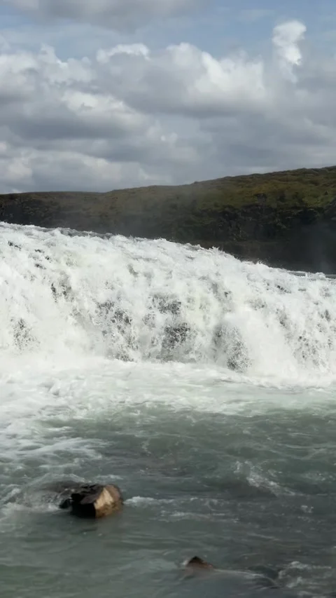 Gullfoss Waterfall plunges into a dramatic canyon in southwest Iceland. Stock Footage 312232922