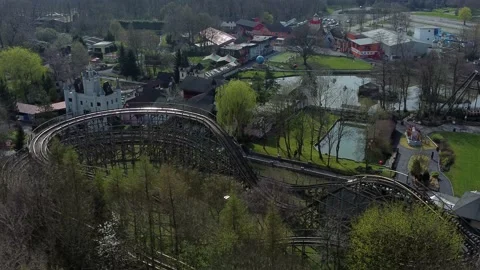 Gulliver's world Warrington rollercoaster castle theme park aerial above Stock Footage 151472718
