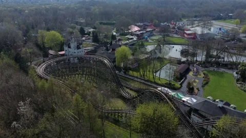 Gulliver's world Warrington rollercoaster empty amusement park aerial view Video stock 151472613