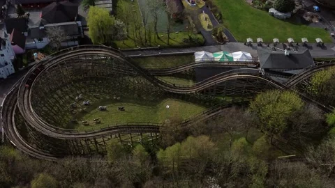 Gulliver's world Warrington rollercoaster theme park aerial view tracking Stock Footage 151472131