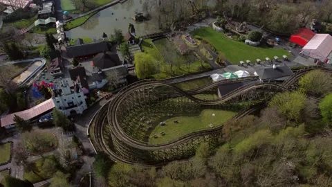Gulliver's world Warrington rollercoaster theme park drone view above Stock Footage 151472337