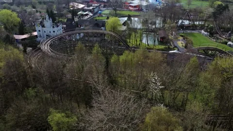Gulliver's world Warrington rollercoaster theme park aerial view above Stock Footage 151472369