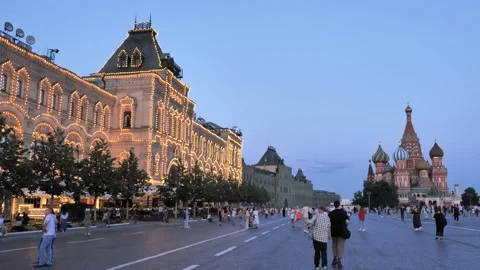 GUM and Red Square in the evening. People walking down the street Stock Footage 166358575