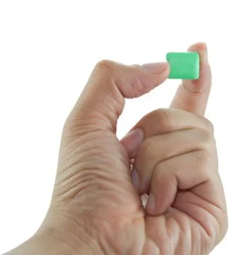 Gum in hand Stock Photos