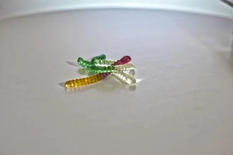 Gummi worms are on a table Stock Photos