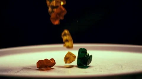 Gummy Bears Drop on Plate Stock Footage 300886912