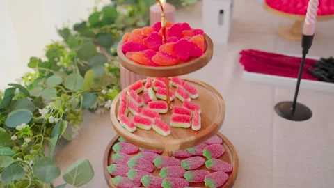 Gummy candy sweets on dessert table for celebration. Stock Footage 345548681