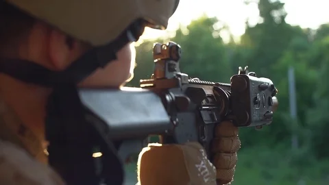 The gun for airsoft closeup. Slow motion Stock Footage 77409463