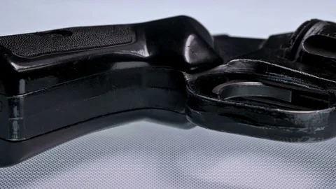 A gun with ammunition on white background Stock Footage 79816600