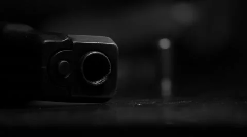 A gun and a bullet 스톡 동영상 40796419