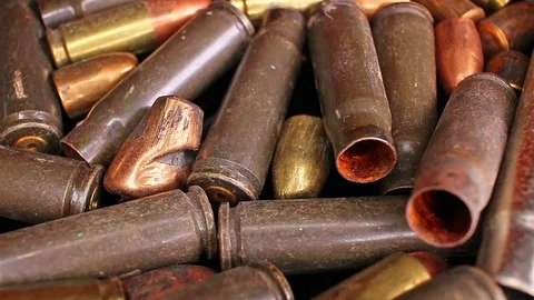 Gun bullets heap bullet war crime gun control concept Video stock 97235467