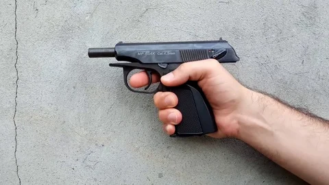 Gun on a dark background Stock Footage 110800085