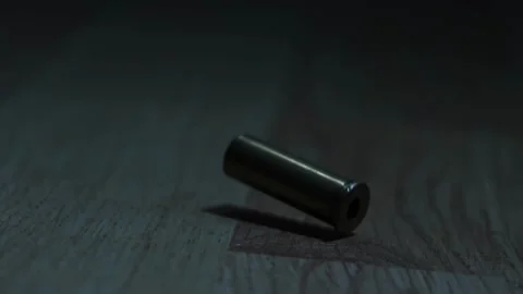 Gun Fired As Bullet Case Falls, At Night Indoors Stock Footage 306003979