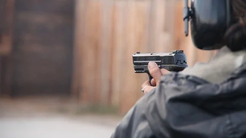Gun fires at targets Stock Footage 114216171