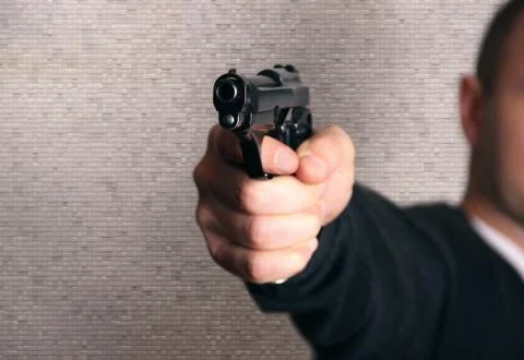 Gun in the hand Stock Photos