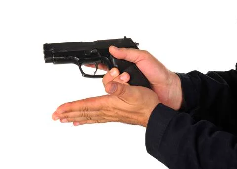Gun in the hand Stock Photos