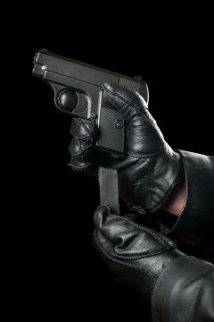 Gun in hand Stock Photos