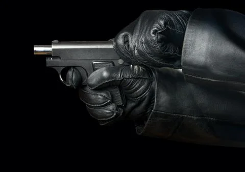 Gun in hand Stock Photos