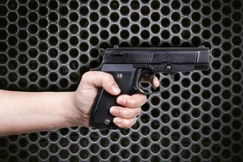 Gun in hand Stock Photos