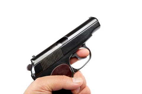Gun in hand on a white background. Stock Photos