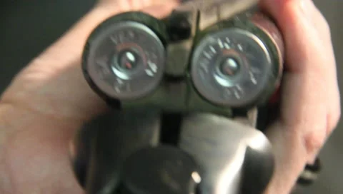 Gun Loading a Shotgun With Shells 4 Stock Footage