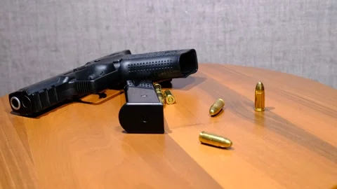 Gun magazine bullets Stock Footage 236286834