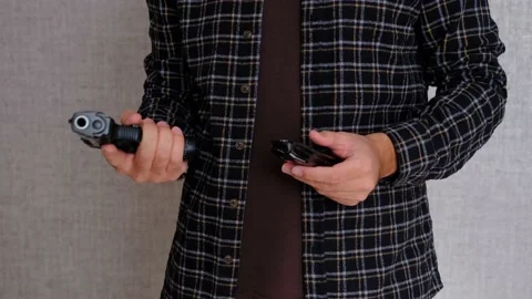 Gun magazine reloading Stock Footage 236286353