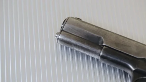 Gun On Metal Background Stock Footage 97624256