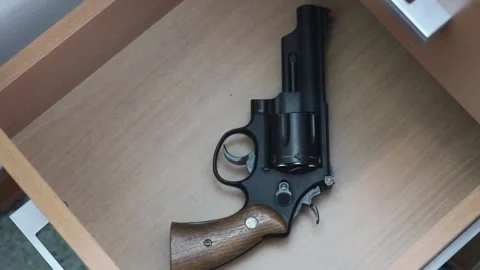 Gun in the nightstand Stock Footage 157670929