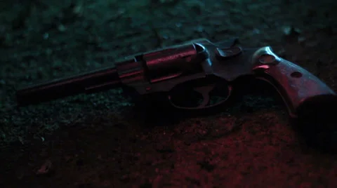 Gun on pavement Stock Footage 38177819