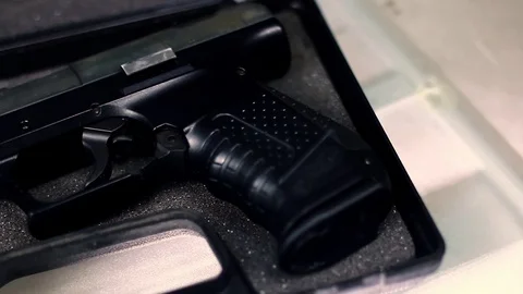 Gun pistol in case with ammo Stock Footage 72961693