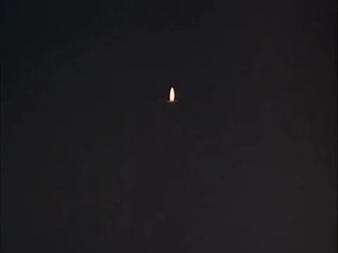 Gun powder is set on fire, then we can see the first tiny bomb that explodes in Video stock 75299779