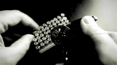 Gun (revolver) Loading (.357) b/w Stock Footage 61738566