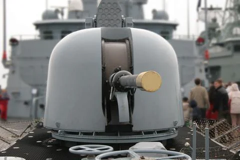 Gun on a ship with a closed barrel. Stock Photos