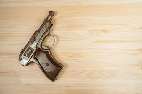 The gun is on the table Stock Photos