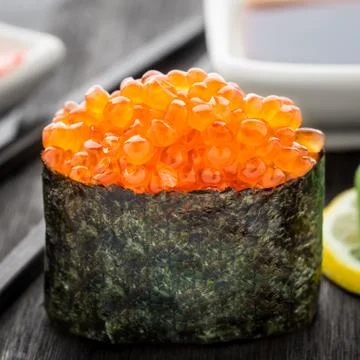 Gunkan with salmon caviar Stock Photos