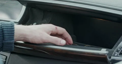The gunman in the car slowly pulls out the tense man and doubts its use. Stock Footage 152109080