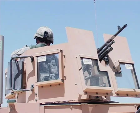 Gunner smoking and checking out enemy positions in Afghanistan Stock Footage 1214398