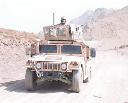 Gunner on top of Humvee Stock Footage 996162