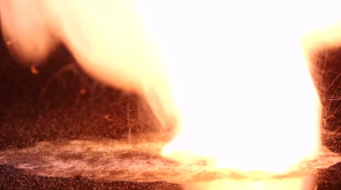 Gunpowder erupts from the smoldering splinter Video stock 61365113