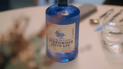 Gunpowder Rack focus Alcool bottle Blue restaurant Stock Footage 164527367