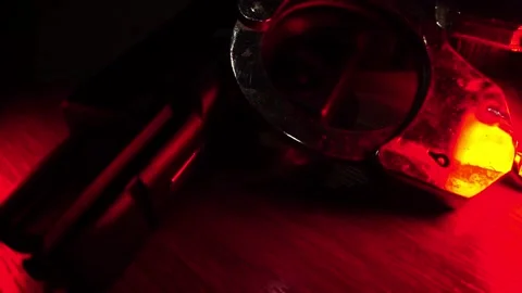 The guns and handcuffs of the murder case are evidence Video stock 224320061