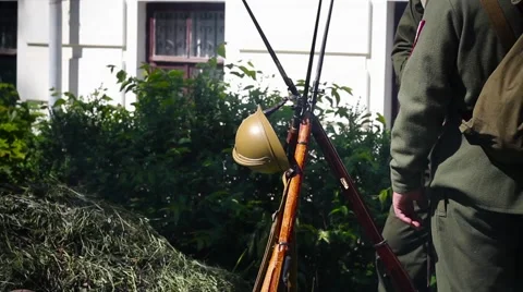 Guns of the First World War are in the smoke fire, leaning on the bayonet knives Stock-Footage 64016264
