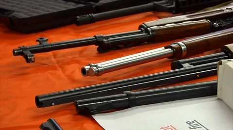 Guns on table at auction Stock Footage 881562
