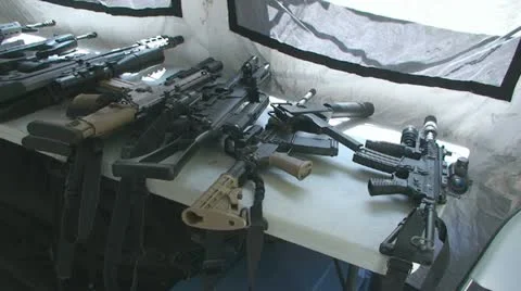 Guns on the table 스톡 동영상 10833391